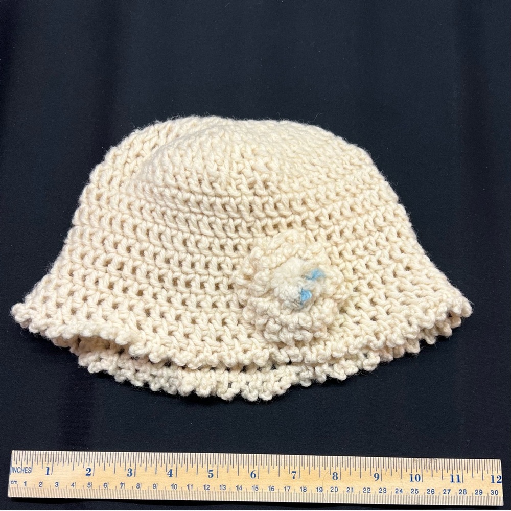 Cream Crochet Hat with Flower Accent